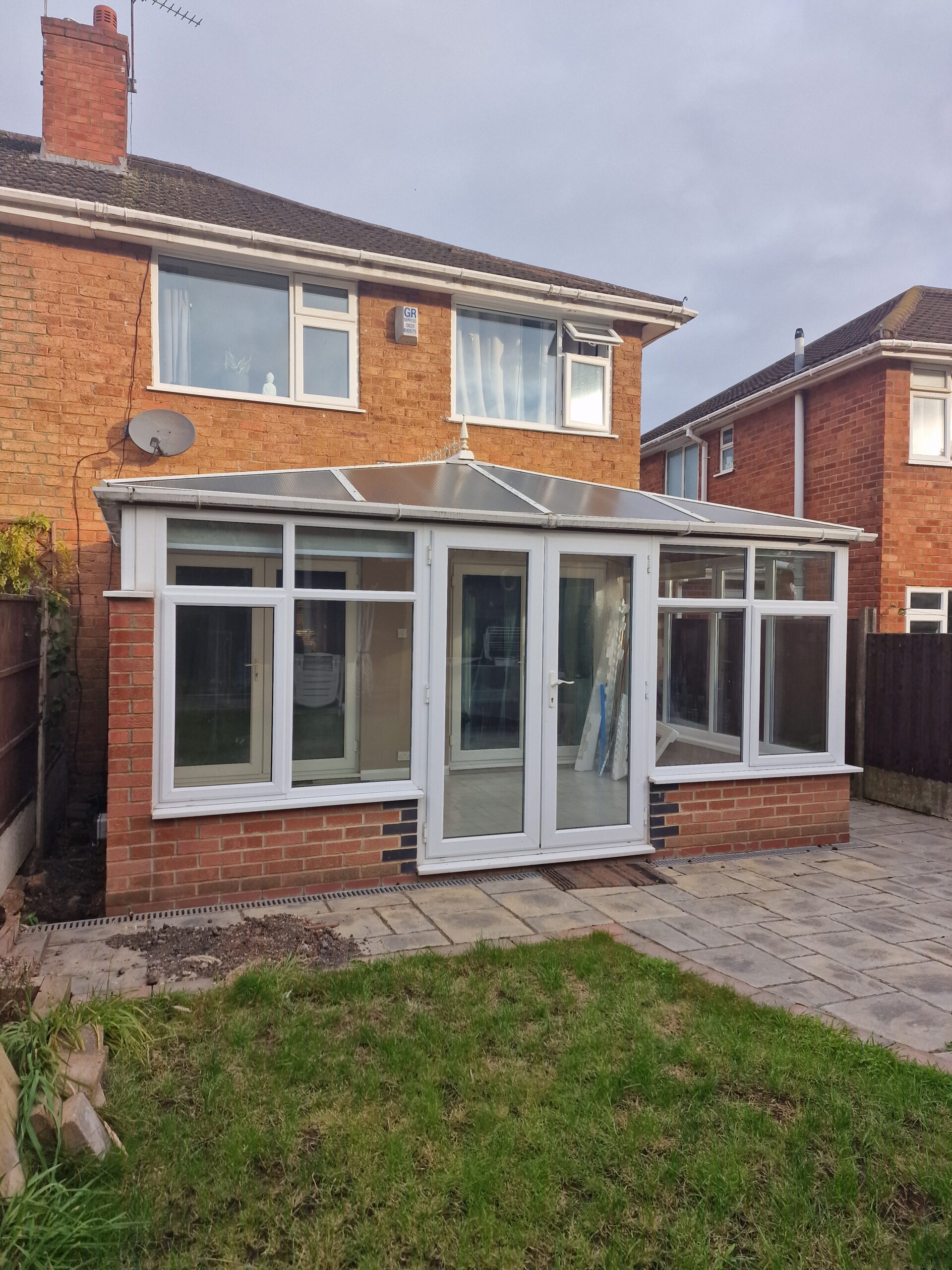 Kings Norton Extension works before picture showing house in Birmingham with a clear roofed extension | ID Property Developments