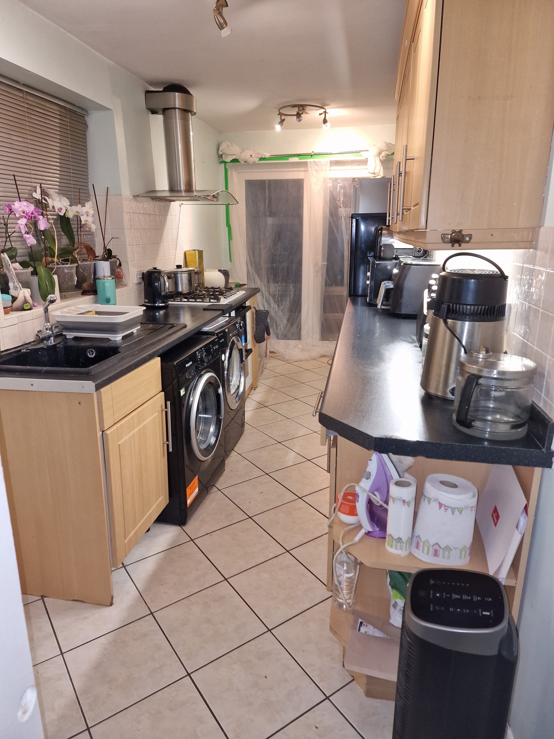 Kings Norton Extension works before picture showing kitchen in Kings Norton home with dust protection | ID Property Developments