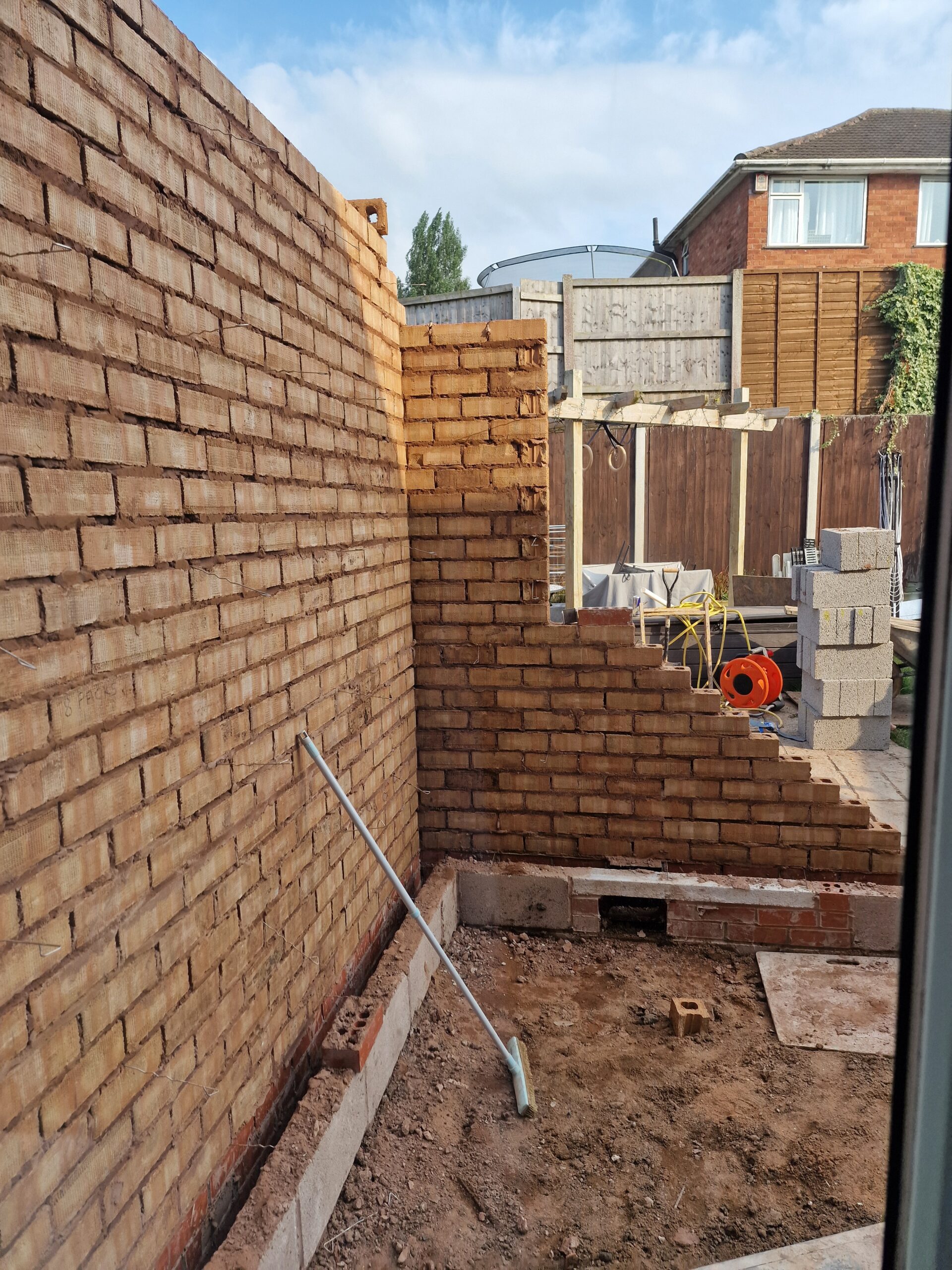 Kings Norton Extension works progress picture showing house in Birmingham with new brickwork | ID Property Developments