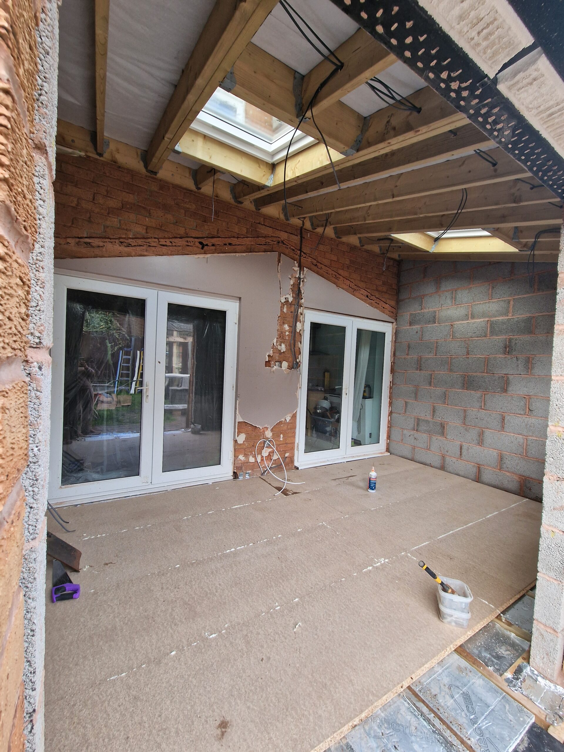 Kings Norton Extension works progress picture showing house in Birmingham with new roof and skylights | ID Property Developments