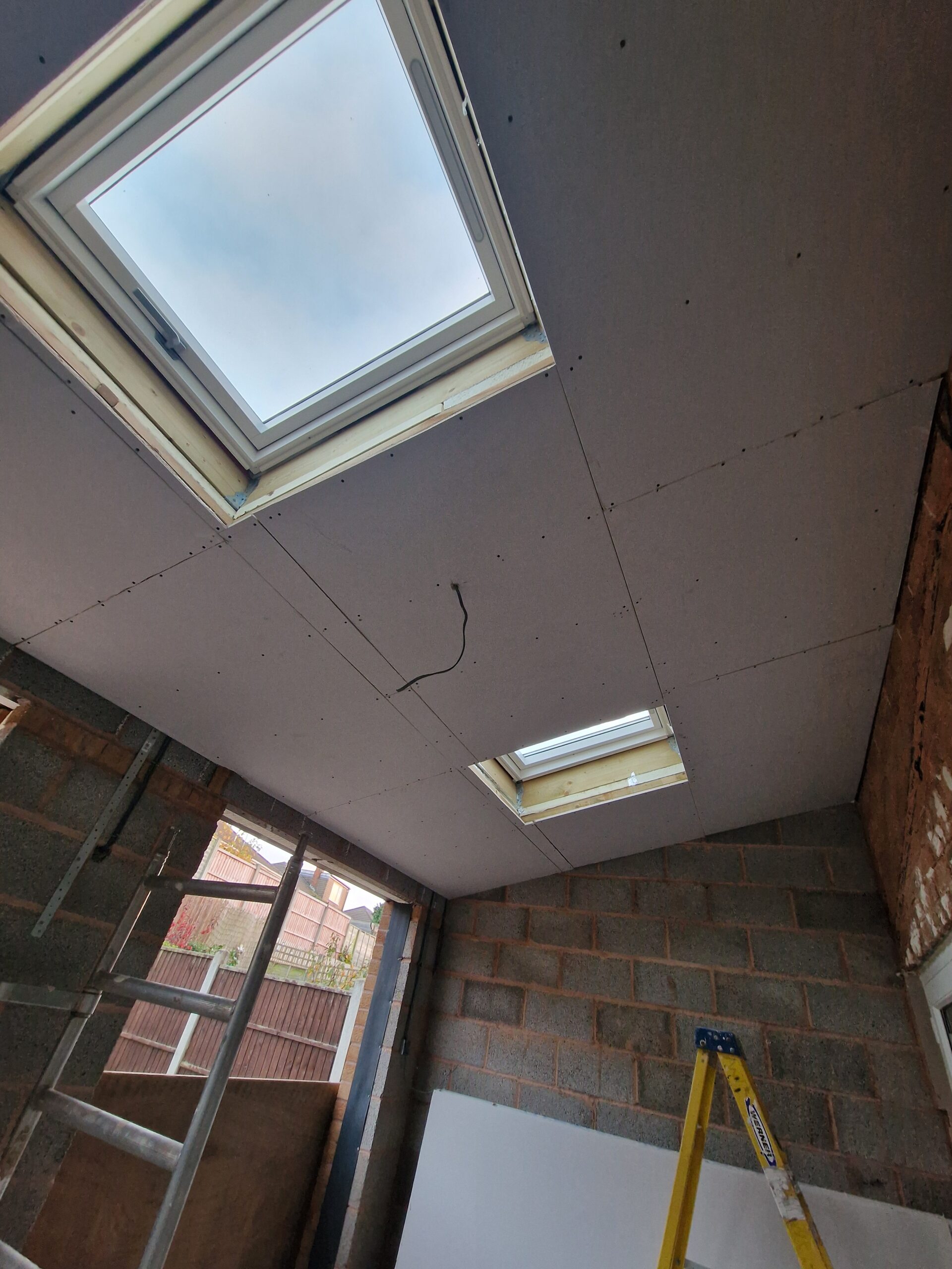 Kings Norton Extension works progress picture showing house in Birmingham with new skylights and ceiling| ID Property Developments