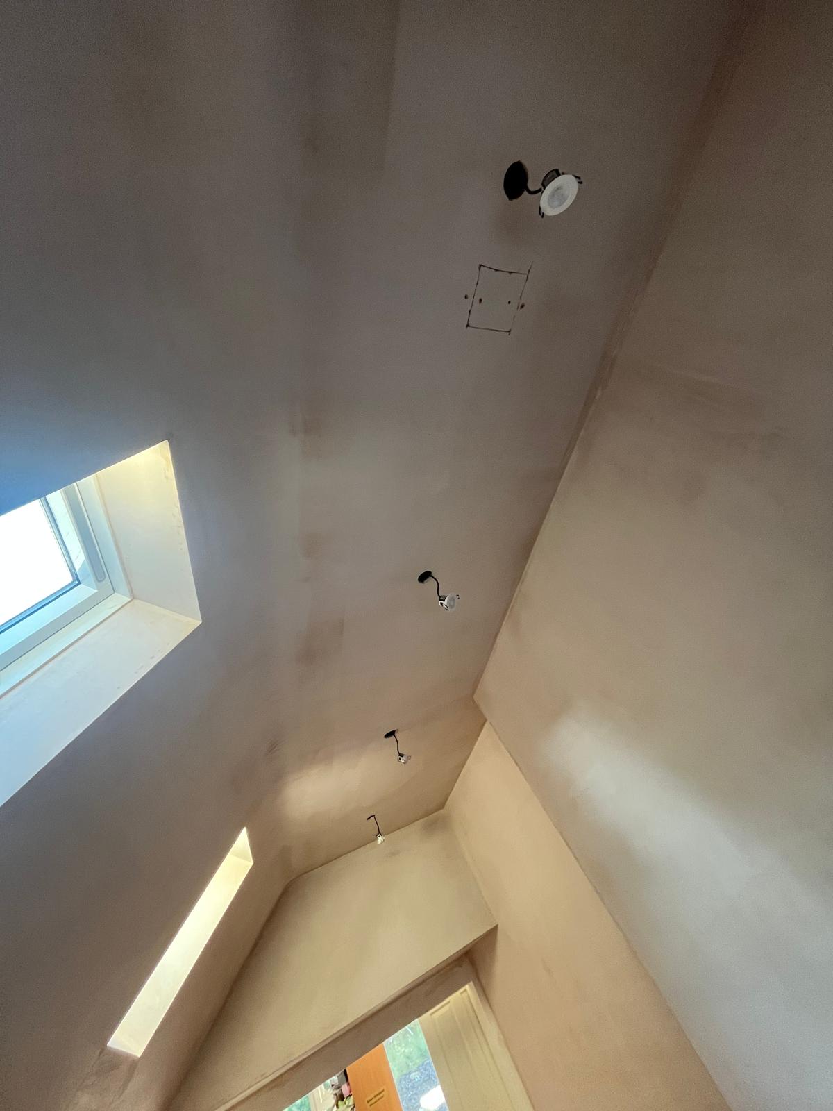 Mid-project plastering, raised ceiling and skylights giving an airy feel to this Garage Conversion - Cofton Hackett - ID Property Developments